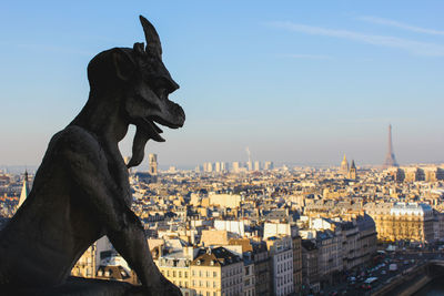 Statue of buildings in city