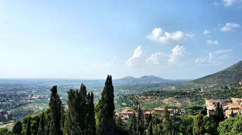 Panoramic view of sea and buildings against sky