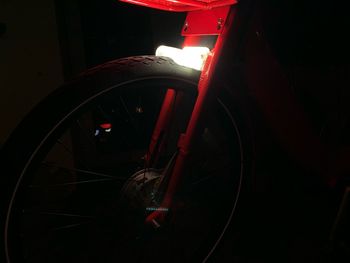 Close-up of illuminated bicycle at night