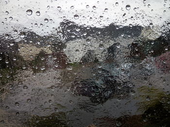 Close-up of water drops on glass