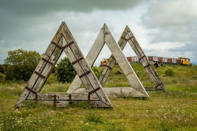 Triangle objects on countryside landscape