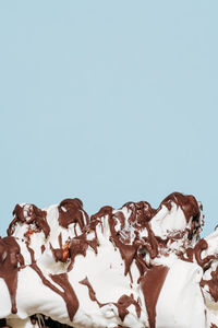 Low angle view of statues against clear sky