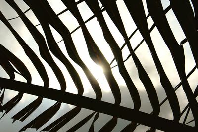 Low angle view of metal structure against sky