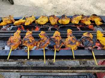 High angle view of various vegetables on barbecue grill