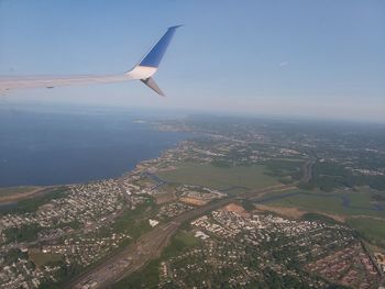 Aerial view of city against sky