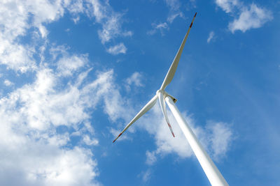 Low angle view of wind turbine against sky