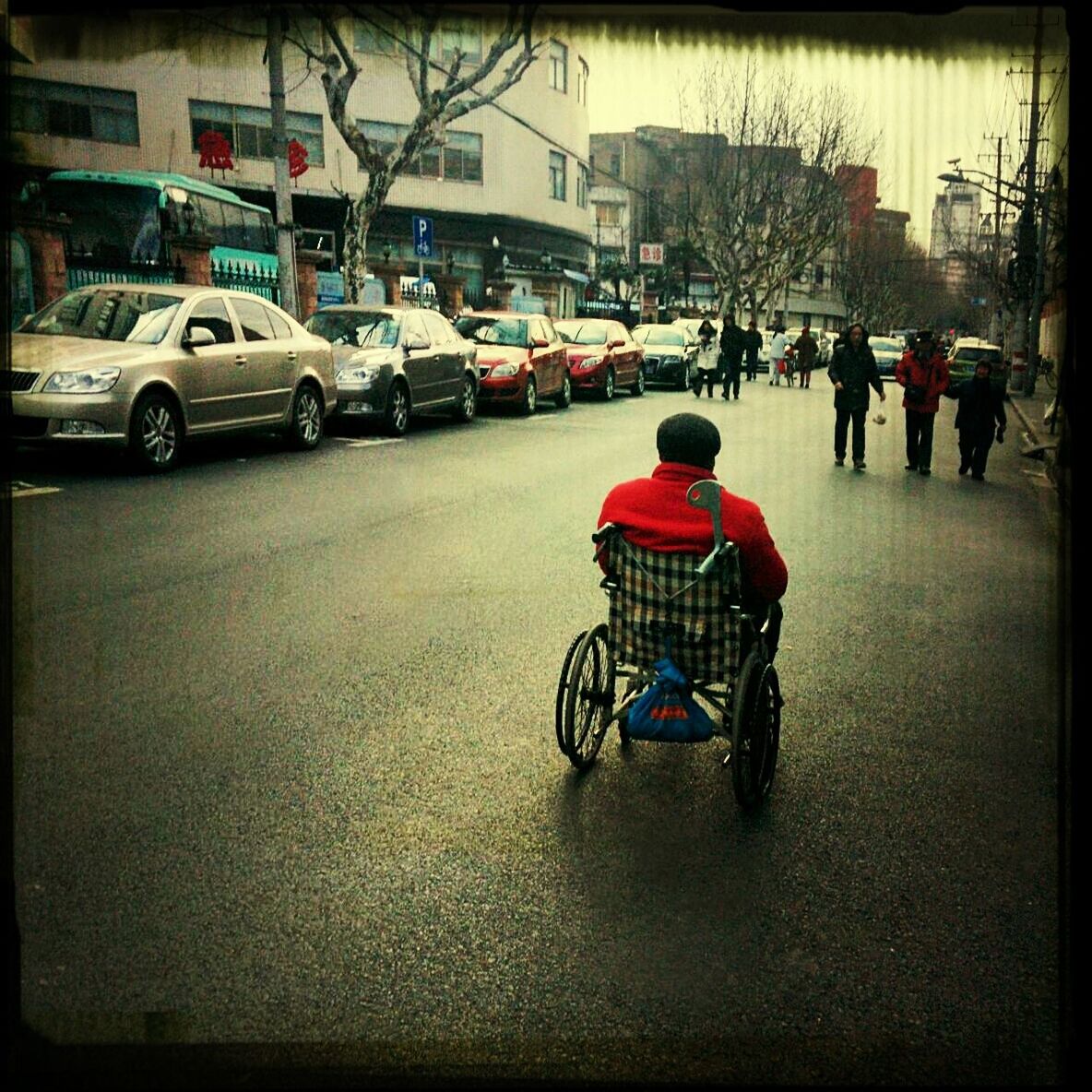 transportation, mode of transport, land vehicle, men, street, person, large group of people, city, city life, transfer print, lifestyles, architecture, building exterior, walking, car, auto post production filter, built structure, leisure activity, travel