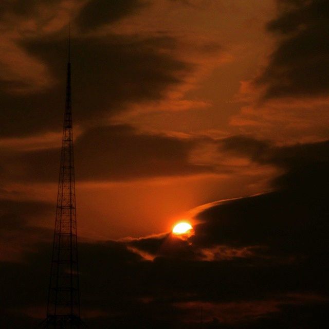 sunset, sky, low angle view, silhouette, electricity pylon, cloud - sky, power line, electricity, orange color, power supply, fuel and power generation, beauty in nature, cloudy, connection, scenics, tranquility, nature, technology, cloud, dramatic sky