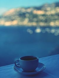 Close-up of coffee cup on table