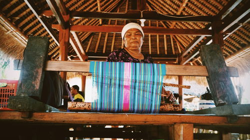 Low angle view of woman working