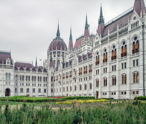 Buildings in city against sky