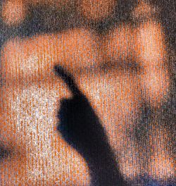 Close-up of shadow on hand