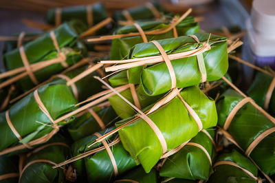 Close-up of food wrapped in banana leaves