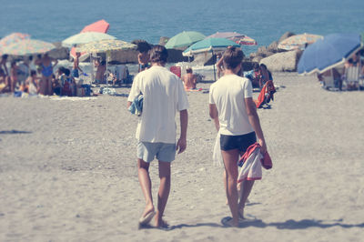 People walking on beach