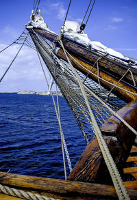 Boat sailing on sea against sky