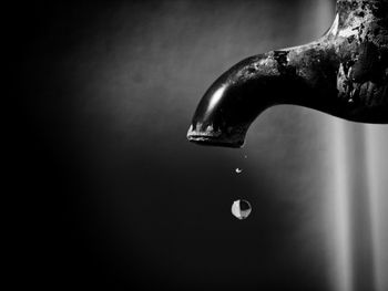 Close-up of water dripping from faucet