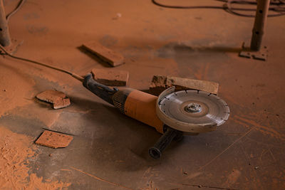 High angle view of circular saw in workshop