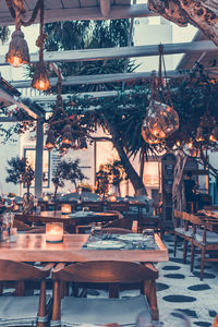 Empty chairs and tables at restaurant