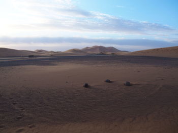 Scenic view of desert against sky