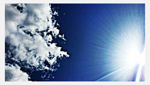 Sun shining through clouds