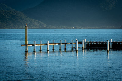 Pier on sea against sky