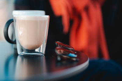 Close-up of coffee cup on table