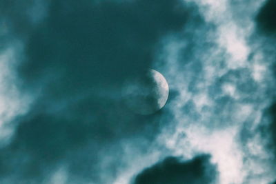 Low angle view of moon against sky