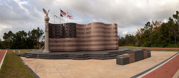 Built structure against cloudy sky