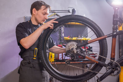 Man working on bicycle