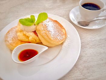 High angle view of breakfast and coffee on table