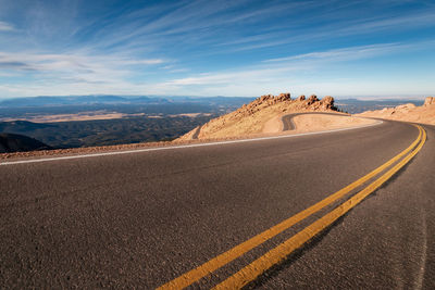 Road on mountain against sky