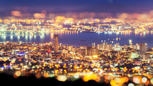 View of illuminated city at night