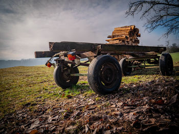 Tractor on field against sky