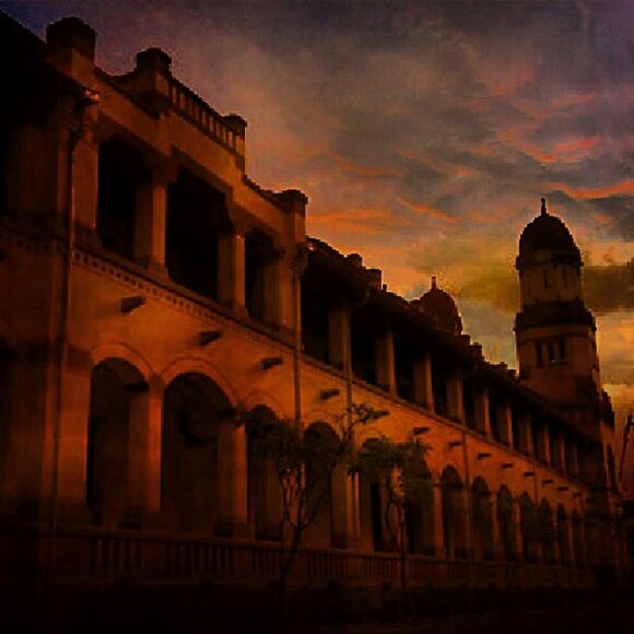 architecture, built structure, building exterior, sky, sunset, low angle view, cloud - sky, place of worship, arch, religion, history, orange color, dusk, cloud, spirituality, outdoors, no people, building, church, cloudy