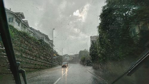 Wet glass in city during rainy season