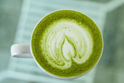 Close-up of coffee or green tea cup