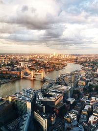 High angle view of city buildings against sky