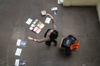 High angle view of people walking on floor