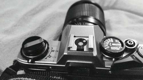 Close-up of camera on table