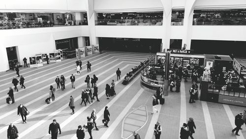 High angle view of people walking in grand central