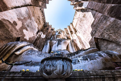 Low angle view of buddha statue