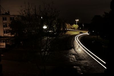 Illuminated street lights at night