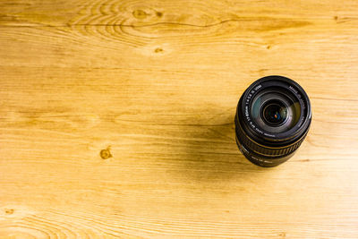 Close-up of camera on table