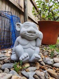 Close-up of statue against plants