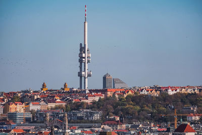 Communications tower in prague against sky