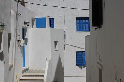 White house hanging on wall of building