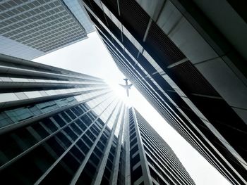 Low angle view of skyscrapers against sky