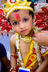 Portrait of sweet child in traditional clothing