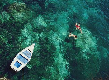 High angle view of person swimming in pool