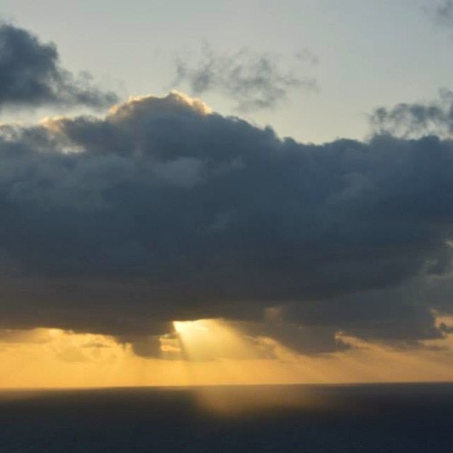 sky, sunset, scenics, cloud - sky, beauty in nature, tranquil scene, tranquility, sea, cloudy, nature, horizon over water, idyllic, cloud, cloudscape, orange color, weather, dramatic sky, silhouette, dusk, overcast